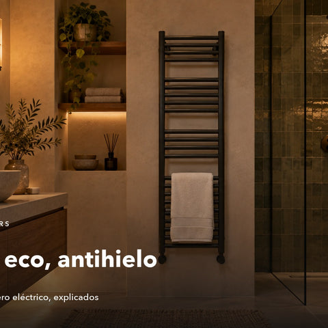 Toallero eléctrico negro en un baño de noche — modos confort, eco y antihielo